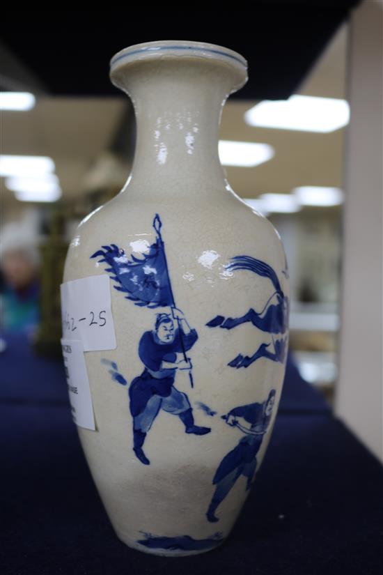 A Chinese blue and white soft paste porcelain vase, 18th century, with a Kangxi mark, 18cm